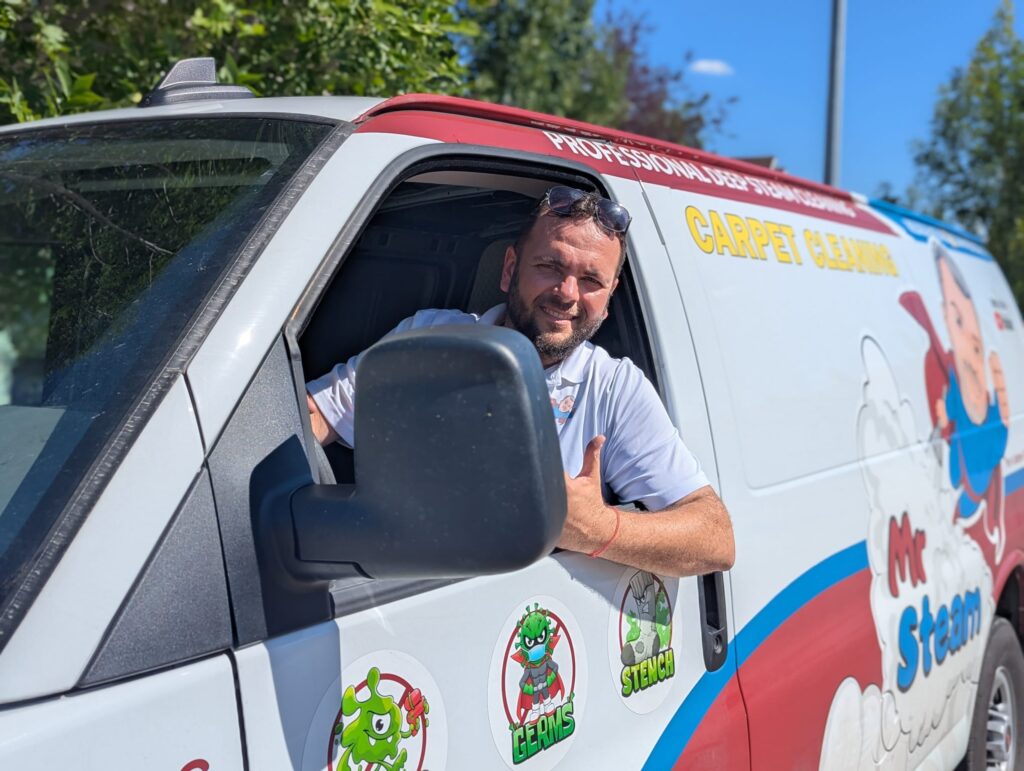 Owner Elias hanging out of his van